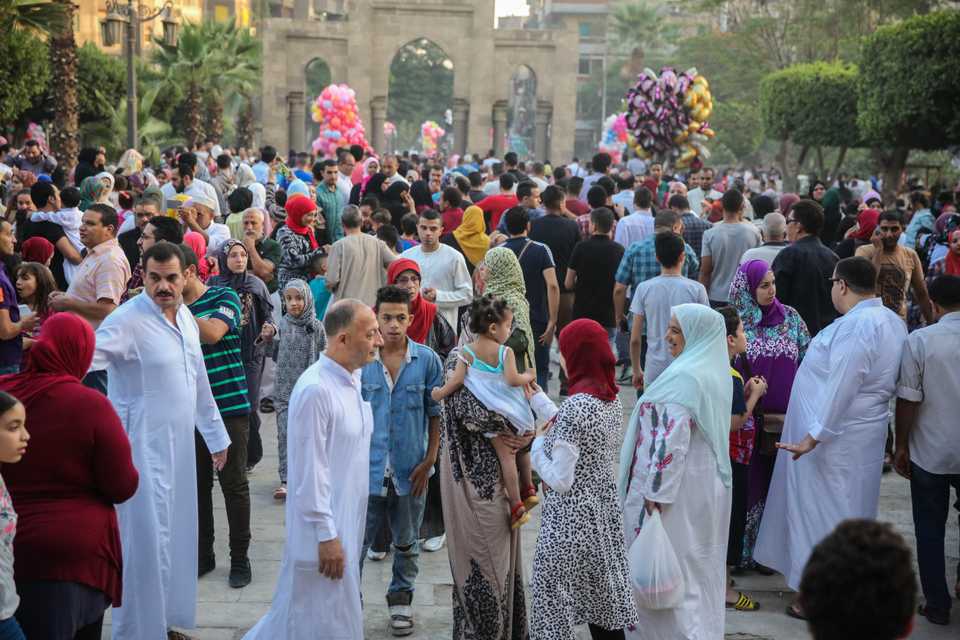 Muslims arrive to perform the Eid al Fitr prayer at mosque and religious school of Sultan Hassan in Cairo, Egypt on June 15, 2018.