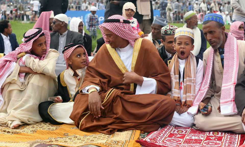 Muslims gather to perform the Eid al Fitr prayer at the stadium in Addis Ababa, Ethiopia on June 15, 2018.