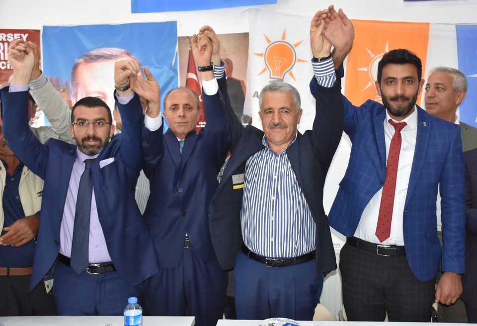 Sezgin Yildiz (R), a MP candidate, Mehmet Karatas (L2) Kagizman district head, and Ahmet Arslan (R2), the minister of transport, greet their supporters during a press conference in Kars, Turkey on June 18, 2018.