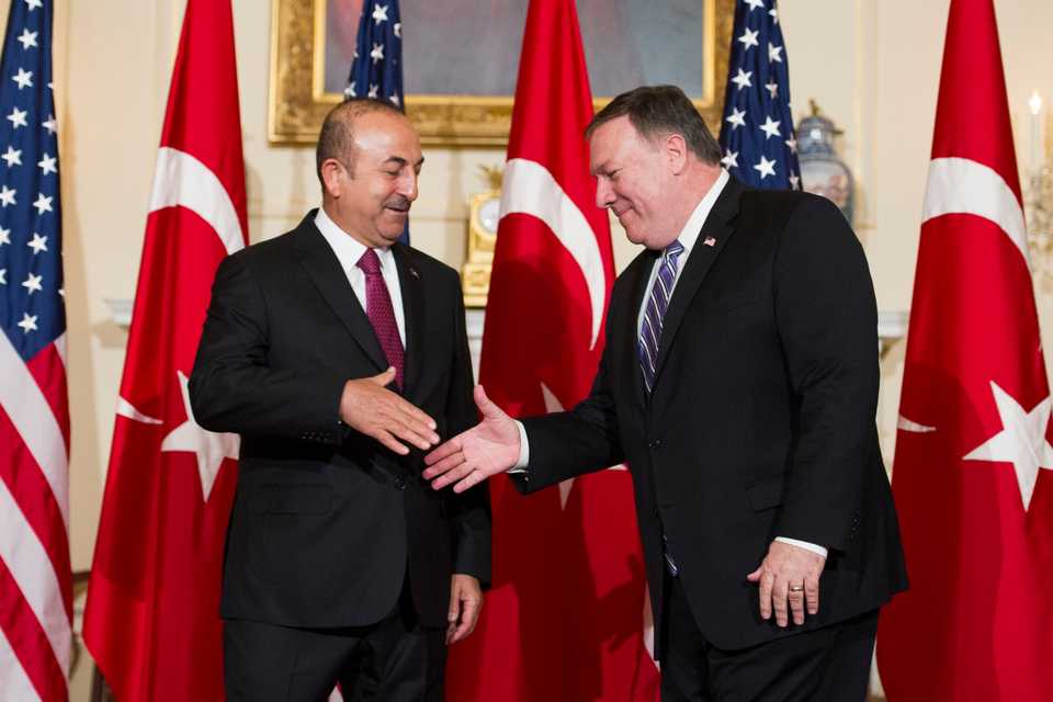 In this June 4, 2018 file photo, US Secretary of State Mike Pompeo, right, meets with Turkish Foreign Minister Mevlut Cavusoglu at the State Department in Washington.