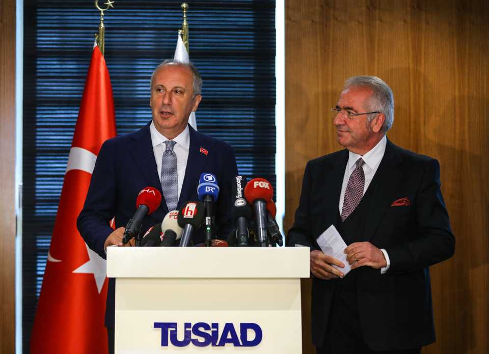 Muharrem Ince (L), the CHP's presidential candidate, speaks during a press conference standing next to Erol Bilecik (L), the head of TUSIAD, in Istanbul, on June 21 2018.