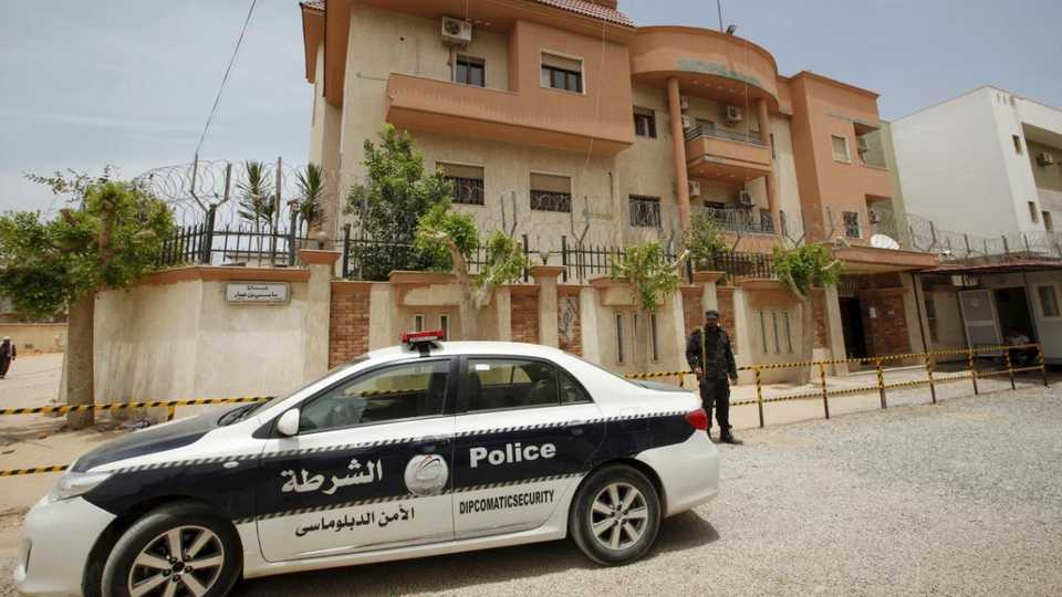 A police vehicle is seen parked in front of the Tunisian consulate in Tripoli, Libya on June 13, 2015.