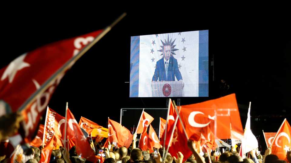 Turkish President Recep Tayyip Erdogan is seen on the screen as he addresses his supporters in Istanbul, Turkey. June 24, 2018.