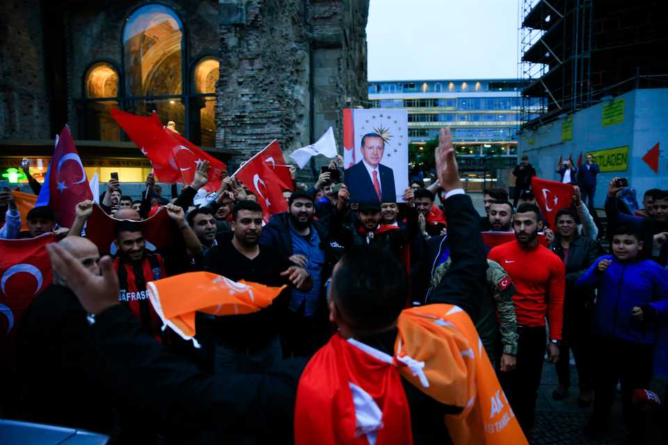 Supporters of AK Party leader Recep Tayyip Erdogan celebrate as unofficial results show Erdogan leading the presidential election at Kurfuerstendamm Avenue in Berlin, Germany on June 24, 2018.