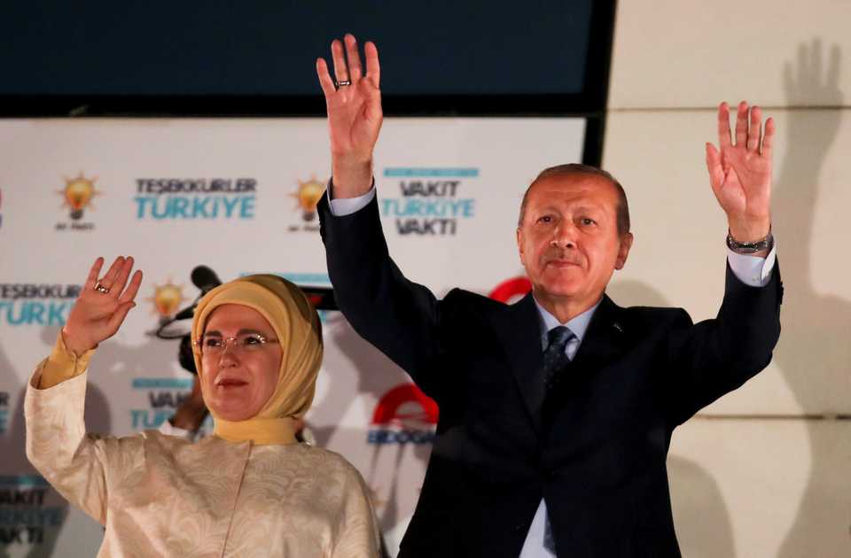Turkish President Recep Tayyip Erdogan and his wife Emine greet supporters gathered in front of the AKP headquarters in Ankara, Turkey on June 25, 2018.