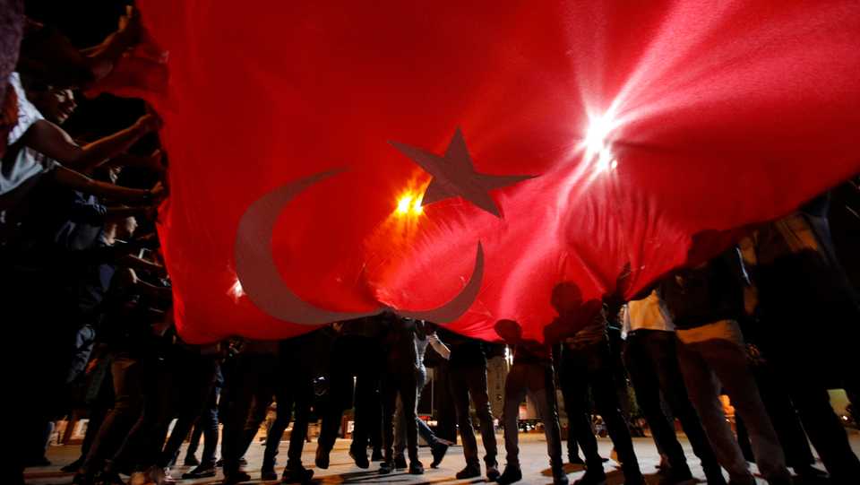 Supporters of Turkish President Recep Tayyip Erdogan celebrate at Taksim square in Istanbul, Turkey June 24, 2018.