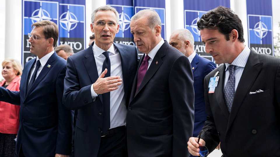 Turkish President Recep Tayyip Erdogan (2nd R) talks to NATO Secretary General Jens Stoltenberg (2nd L) during the 2018 NATO Summit at NATO headquarters on July 11, 2018 in Brussels, Belgium.