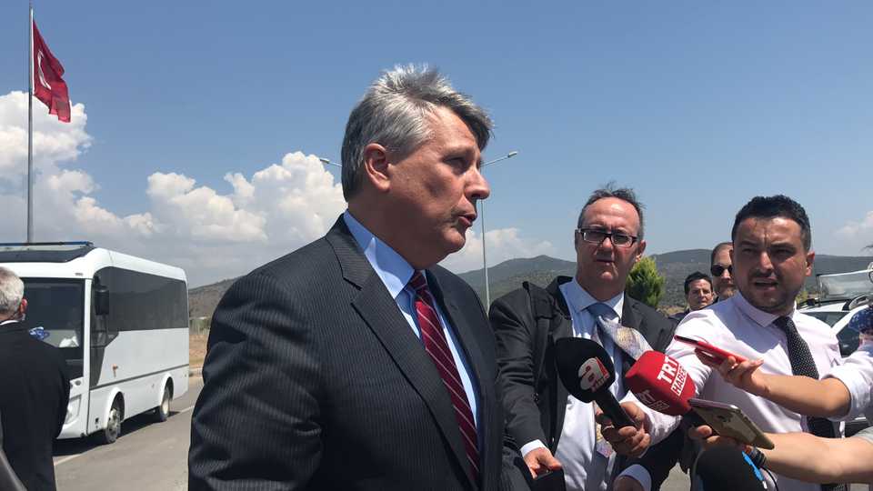 US Charge d'Affaires Philip Kosnett speaks to reporters outside the courtroom where US pastor Brunson appeared and a court ordered that he be detained in custody.