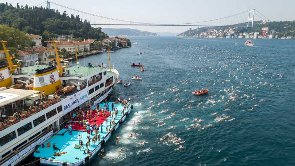Participants swim during the 30th Bosphorus Cross-continental Swimming competition over the Bosphorus strait between Istanbul's Asian and European sides, Turkey, July 22, 2018.