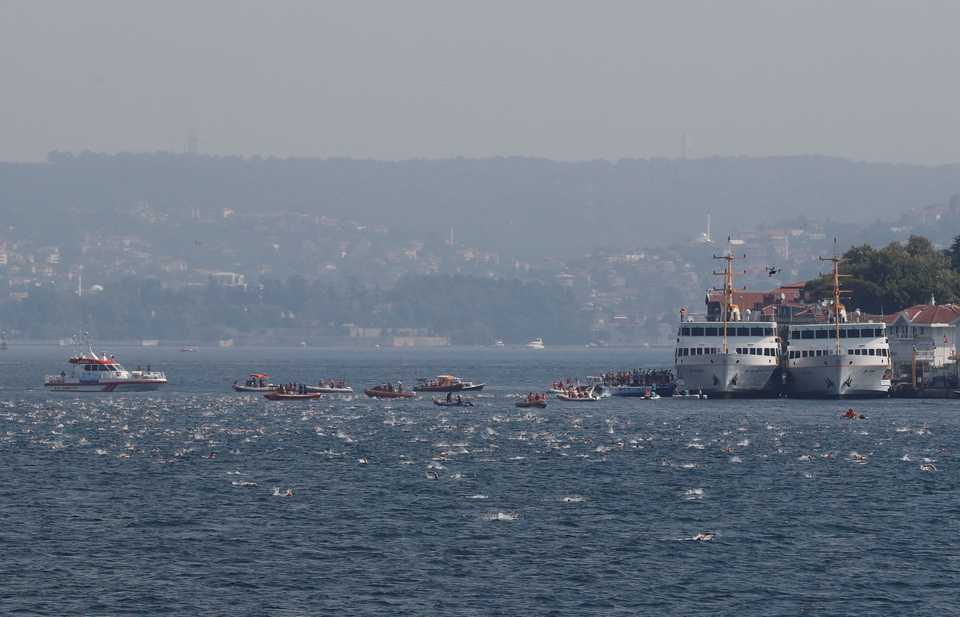 The annual race from Istanbul’s Asian side to European side, sees hundreds of swimmers cross the Bosphorus in the only cross-continental swimming contest, Turkey, July 22, 2018.