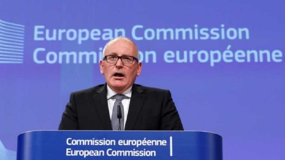 Timmermans gives a news conference at the European Commission.