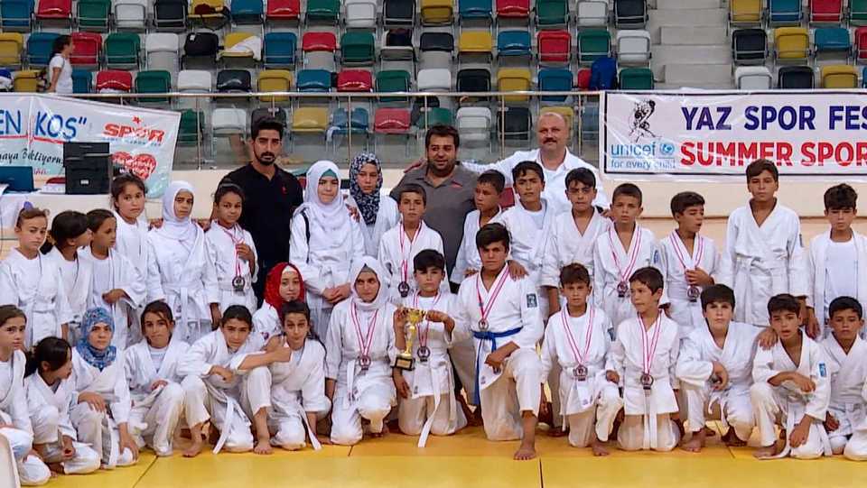 Syrian refugee children win 14 medals in a judo tournament in Turkey's border town of Kilis.