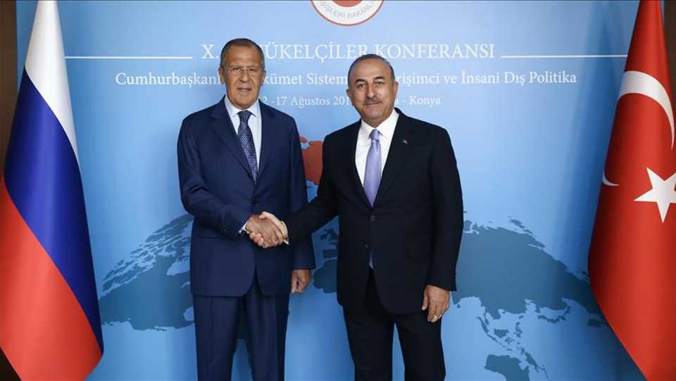 Russian Foreign Minister Sergey Lavrov (L) and Turkey's Foreign Minister Mevlut Cavusoglu (R) during the Turkish Ambassadors Conference in Ankara, Turkey. August 14 2018.