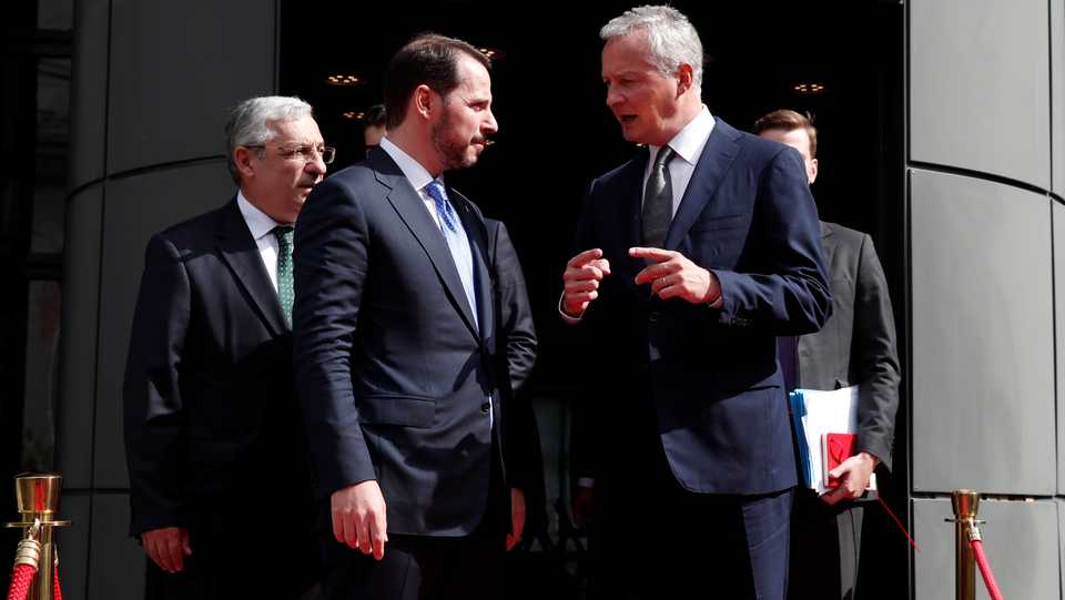 French Finance Minister Bruno Le Maire accompanies Turkish Finance Minister Berat Albayrak after a meeting at the Bercy Finance Ministry in Paris, France, August 27, 2018.