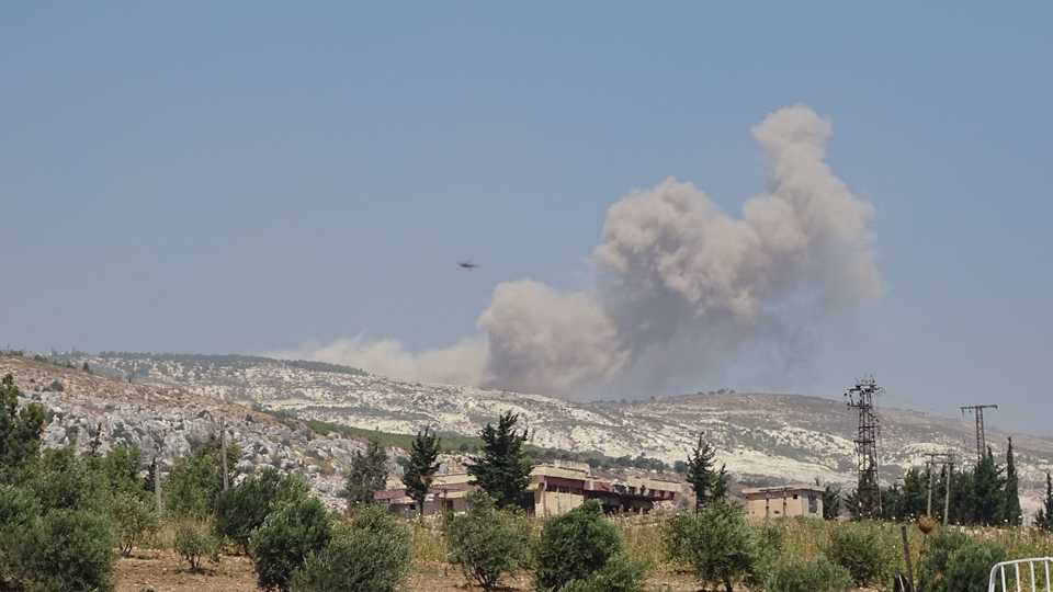Smoke rises after Russian warplanes hit many civilian residential areas in Jisr al Shughour City; areas of Basanqul, Ghani, Innab, Sirmaniyah, west of Idlib; and the front lines of the opposition in Syria’s northwestern Idlib province on September 4, 2018.