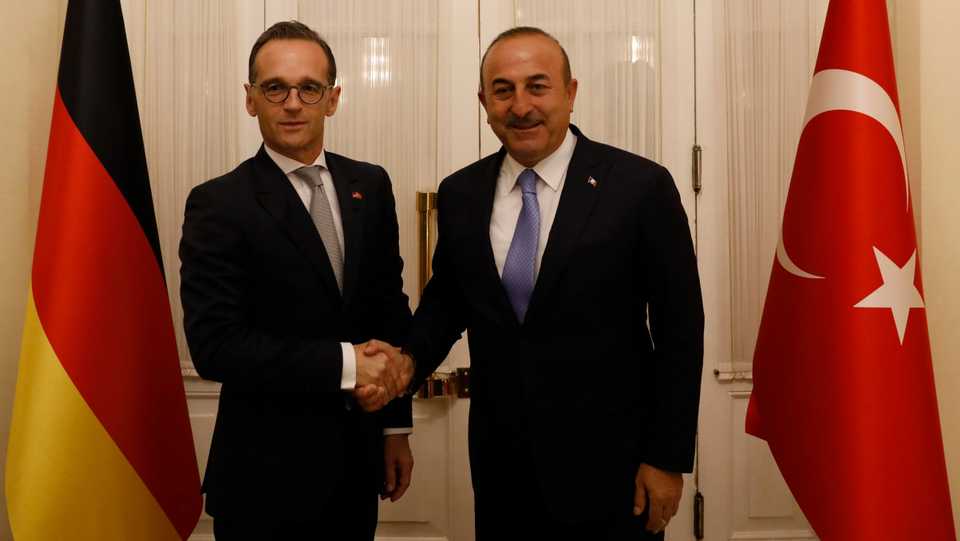 Turkish Foreign Minister Mevlut Cavusoglu shakes hands with his German counterpart Heiko Maas before a news conference in Ankara, Turkey on September 5, 2018.