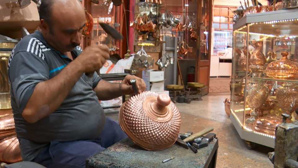 Traditional Turkish coppersmith Murat Soguk works on a piece in his workshop in Gaziantep, Turkey.