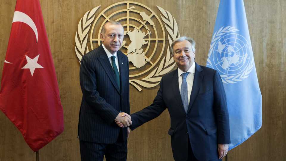 President of Turkey, Recep Tayyip Erdogan (L) shakes hands with Secretary-General of the UN, Antonio Guterres (R) as they pose for a photo ahead of the 73rd Session of UN General Assembly in New York, United States on September 24, 2018.