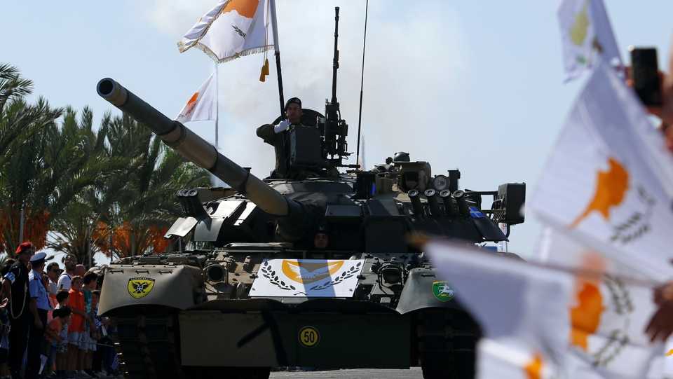 Greek Cypriot armoured vehicles participate in a military parade in Nicosia, southern Cyprus on October 1, 2018.