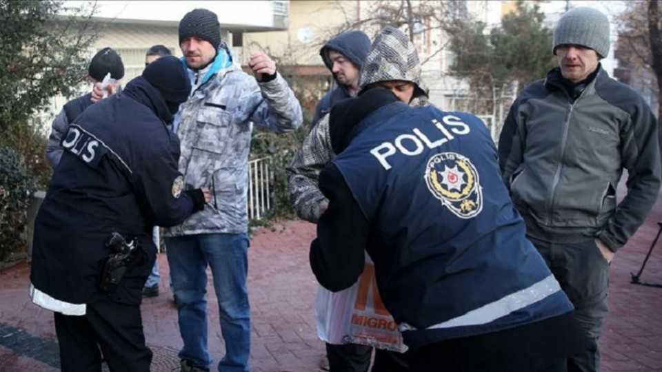 Security forces search people at the control point on the street in front of the Russian Embassy in Ankara, Turkey on December 20, 2016.