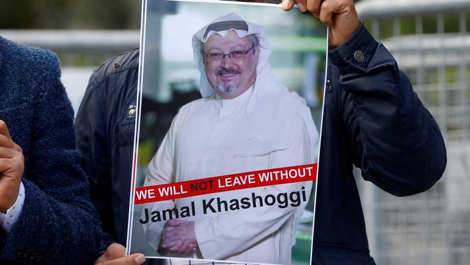 A demonstrator holds picture of Saudi journalist Jamal Khashoggi during a protest in front of Saudi Arabia's consulate in Istanbul, Turkey, October 5, 2018.