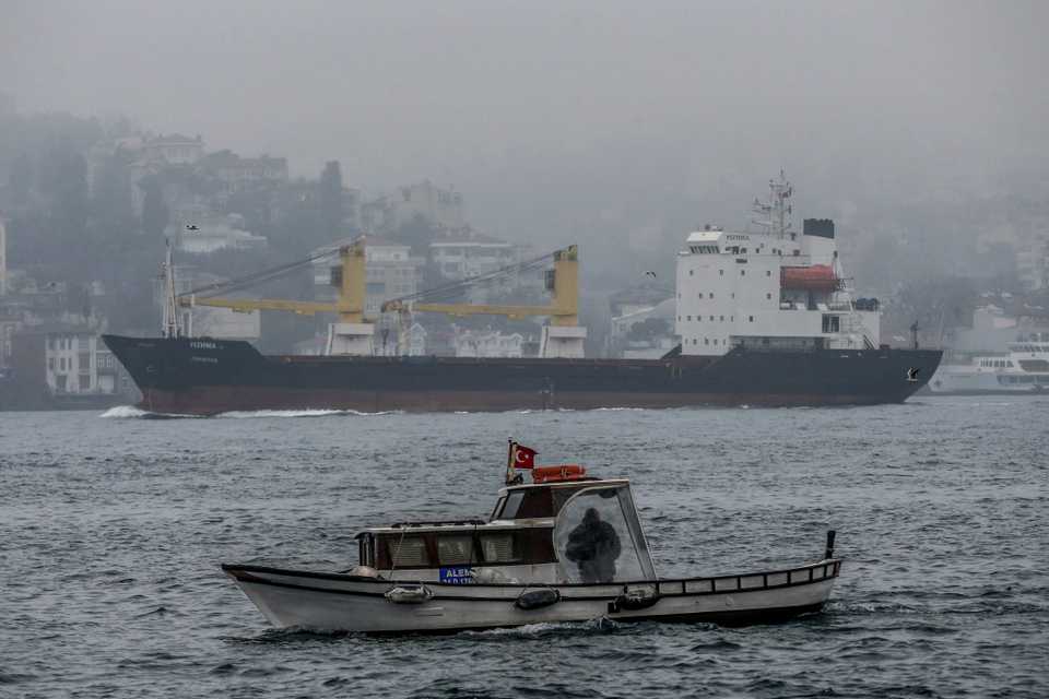 A transport ship passes through the Bosphorus in Istanbul. Tankers travelling through the Bosphorus carry about 140 million tonnes of oil each year.