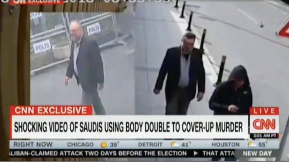 Jamal Khashoggi (L) near the Saudi consulate in Istanbul on October 2, as an alleged Saudi agent Mustafa al Madani (R), dressed as a Khashoggi body double, passes by on the day of the journalist's murder, in this video released by CNN, Octber 22, 2018.