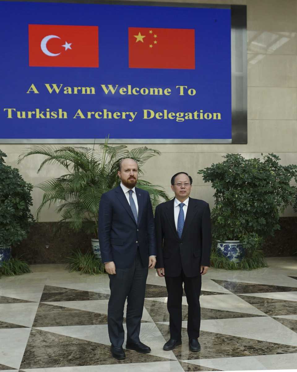 Member of the Board of Trustees of the Turkish Archers Foundation Bilal Erdogan and Director of the China's State General Administration of Sports Gou Zhongwen are seen in this file photo.