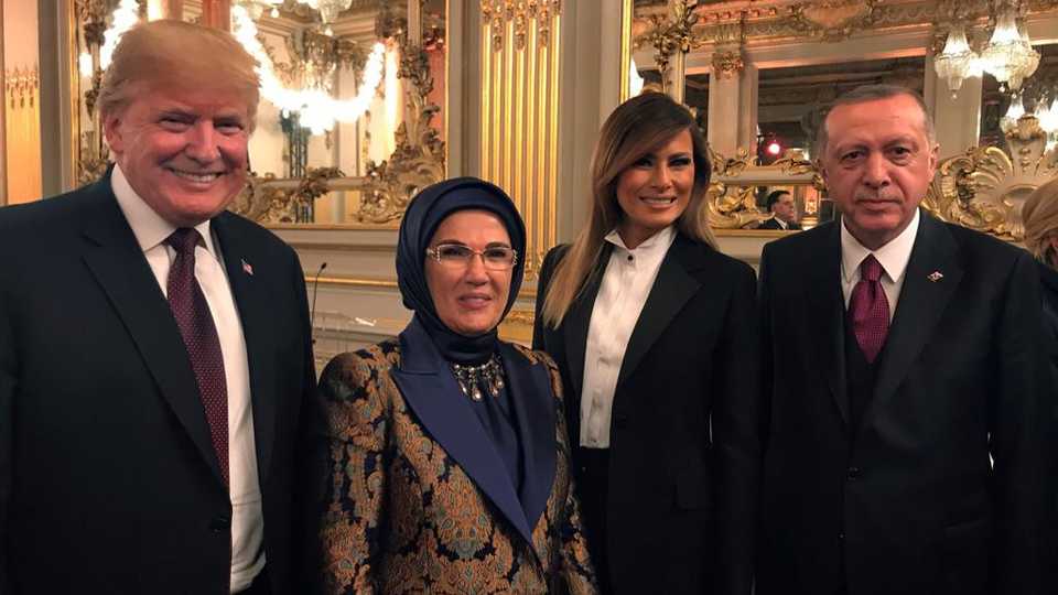 US President Donald Trump, Turkey's First Lady Emine Erdogan, US First Lady Melania Trump and Turkey's President Recep Tayyip Erdogan attend a dinner for world leaders in Paris on Saturday, November 11, 2018.