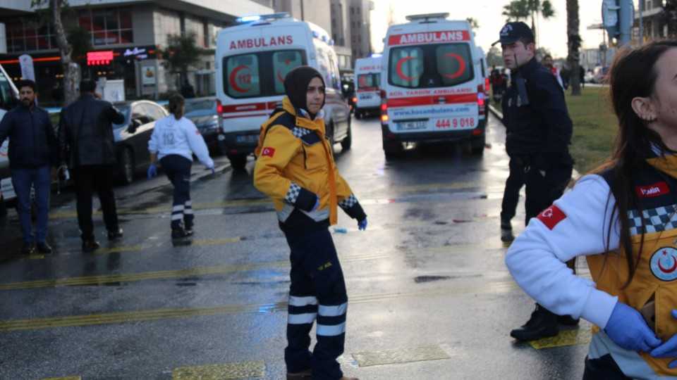 Medics arrive at the scene after an explosion outside a courthouse in Izmir, Turkey, January 5, 2017.
