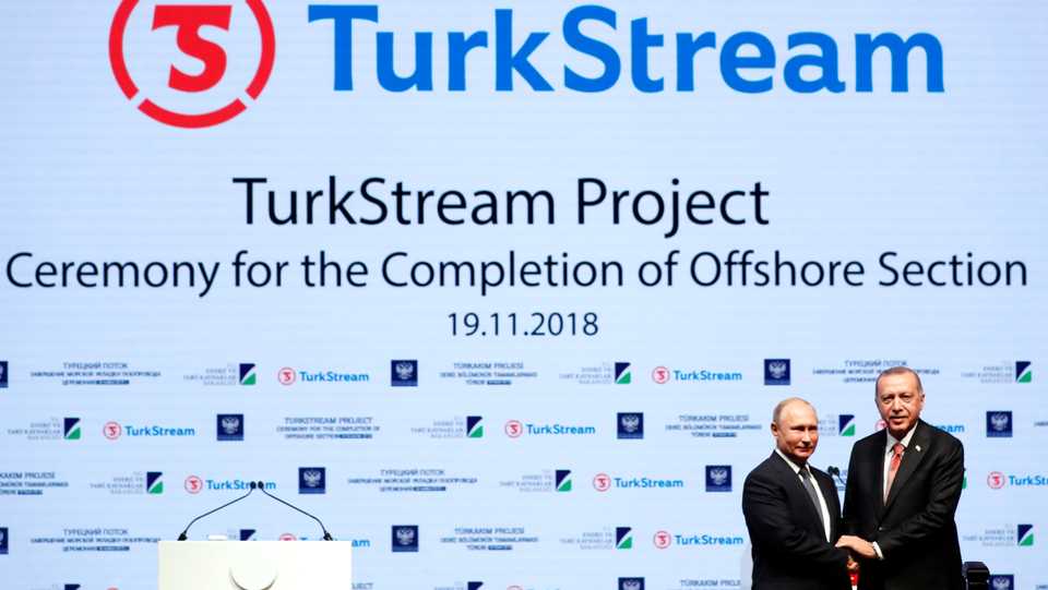 Turkish President Recep Tayyip Erdogan and his Russian counterpart Vladimir Putin shake hands as they attend a ceremony to mark the completion of the sea part of the TurkStream gas pipeline, in Istanbul, Turkey November 19, 2018.