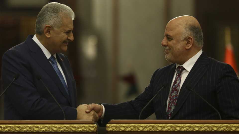 Turkish Prime Minister Binali Yildrim (L) arrived in Baghdad on Saturday for an official visit to Iraq.