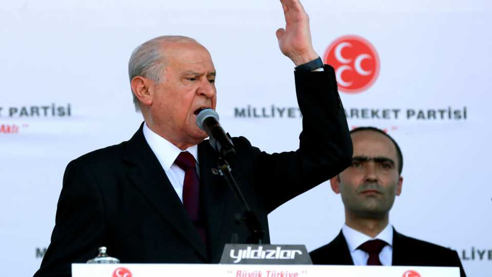 Devlet Bahceli, leader of Turkey's Nationalist Movement Party (MHP), addresses supporters during an election rally in Ankara, June 23, 2018.