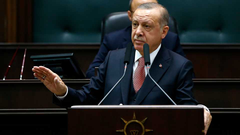 President of Turkey and the AK Party Chairman Recep Tayyip Erdogan speaks during his party's group meeting in Parliament on November 27, 2018.