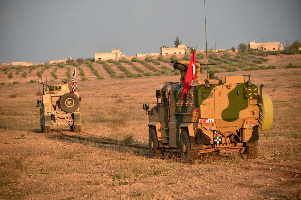 Turkish and US troops are pictured during a joint patrol in Manbij area, northern Syria November 8, 2018.