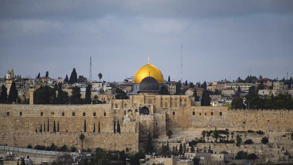 Masjid al-Aqsa, with the black dome, is located in the Old City of Israel-occupied East Jerusalem.