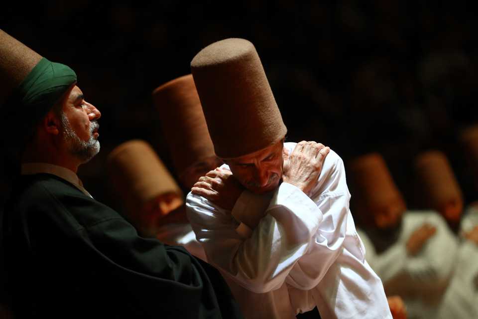 Members of Konya Turkish Sufi Music Ensemble perform Sema ceremony during an event to commemorate 745th death anniversary of Mevlana Jalaluddin al-Rumi, in Konya, Turkey (December 16, 2018).
