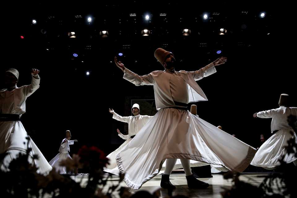Dervishes perform during a ceremony marking the 745th death anniversary of Mevlana Jalaluddin al-Rumi in Istanbul, Turkey (December 17, 2018).