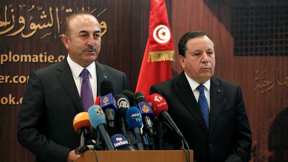 Turkish Foreign Minister Mevlut Cavusoglu speaks during a news conference with his Tunisian counterpart Khemaies Jhinaoui in Tunis, Tunisia December 24, 2018.