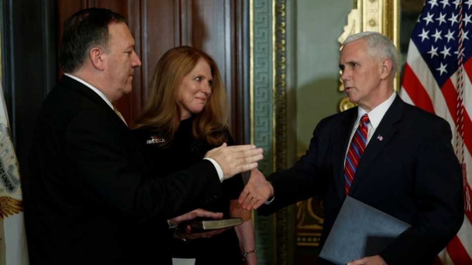 US Vice President Mike Pence (R) finishes swearing in Mike Pompeo (L) as director of the Central Intelligence Agency (CIA), at the White House in Washington DC.