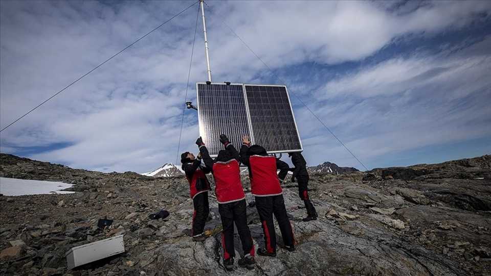 Researchers setting up the meteorological monitoring station as part of Turkey's Third National Antarctic Science Expedition.