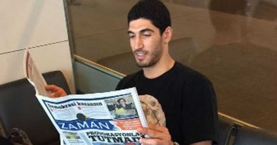 Kanter seen reading now defunct FETO-linked newspaper Zaman in this file photo.
