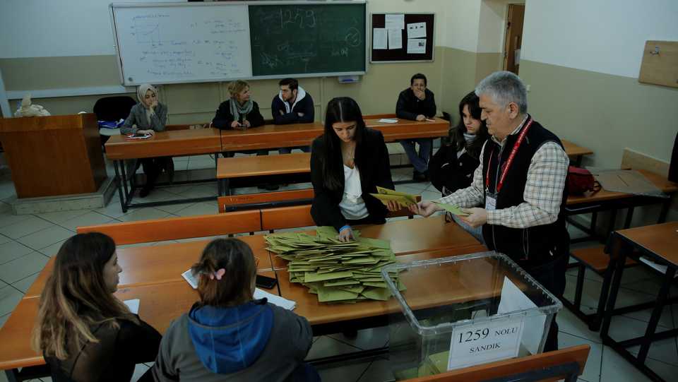Officials begin the process of counting ballots after polls closed during local elections in Istanbul, Turkey, March 31, 2019.