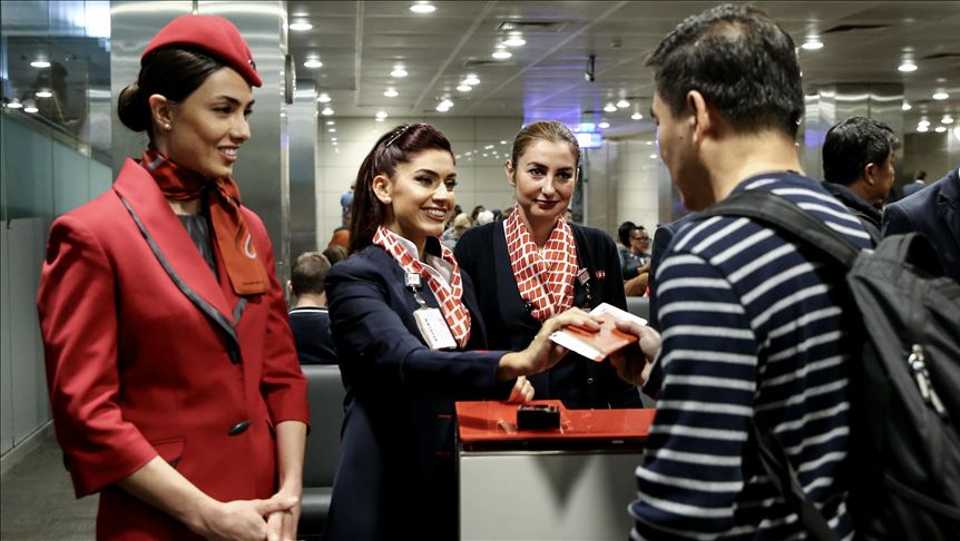 A passenger gets his passport and ticket checked at a boarding gate for Turkish Airlines' last flight to Singapore from Ataturk Airport, as Ataturk Airport is being moved to Istanbul Airport within “The Great Move”, in Istanbul, Turkey on April 06, 2019.