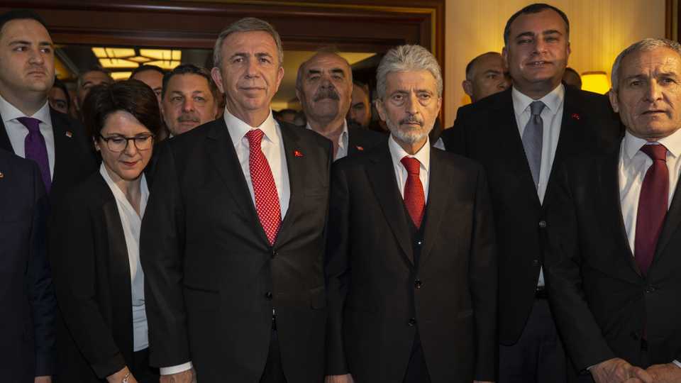 Republican People's Party's Mansur Yavas (3rd L) takes over his post from Mustafa Tuna (3rd R) with a handover ceremony in Ankara, Turkey on April 8, 2019.