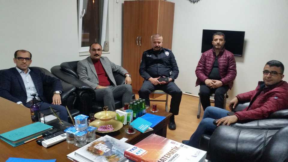 District Governor Temel Ayca, AK Party Mayor Ensar Dundar, Police Chief Oktay Kapsiz, Head of Anti-Terror Unit Vehbi Ozdil and Deputy Mayor Evren Bozkurt at the office of Cukurca police chief on April 3, 2019.