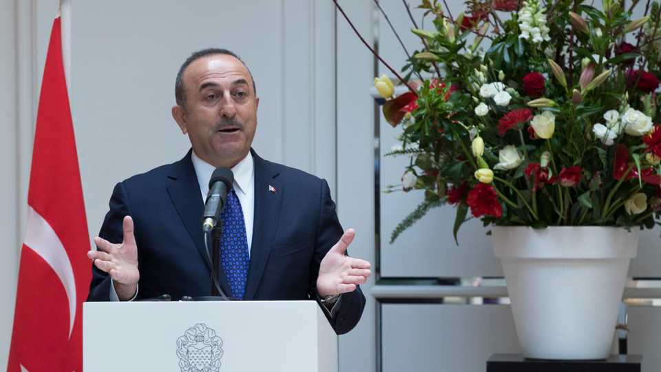 Turkey's Foreign Minister Mevlut Cavusoglu gestures during a press conference in Amsterdam, Netherlands, Thursday, April 11, 2019.
