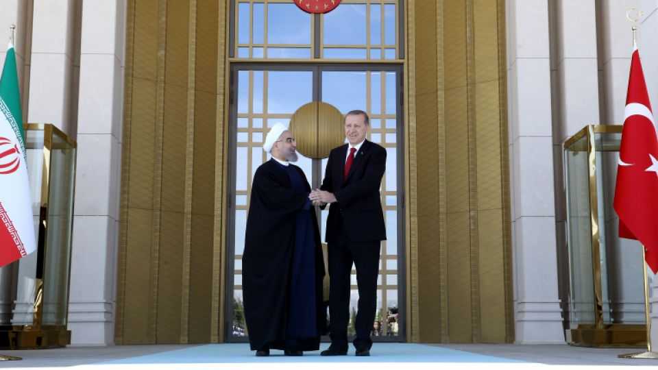 President of Turkey Recep Tayyip Erdogan and Iranian President Hassan Rouhani shake hands during an official welcoming ceremony at Presidential Complex in Ankara, Turkey on April 16, 2016.