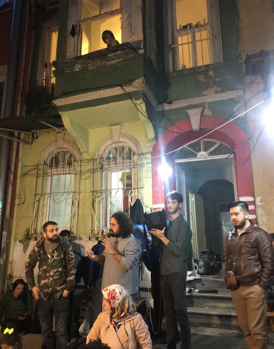 A speech by the community organisers representing the Tarlabasi Solidarity Group. Kadri Bal (L) speaking to the people after iftar and his brother Eyup Omer Bal far right.