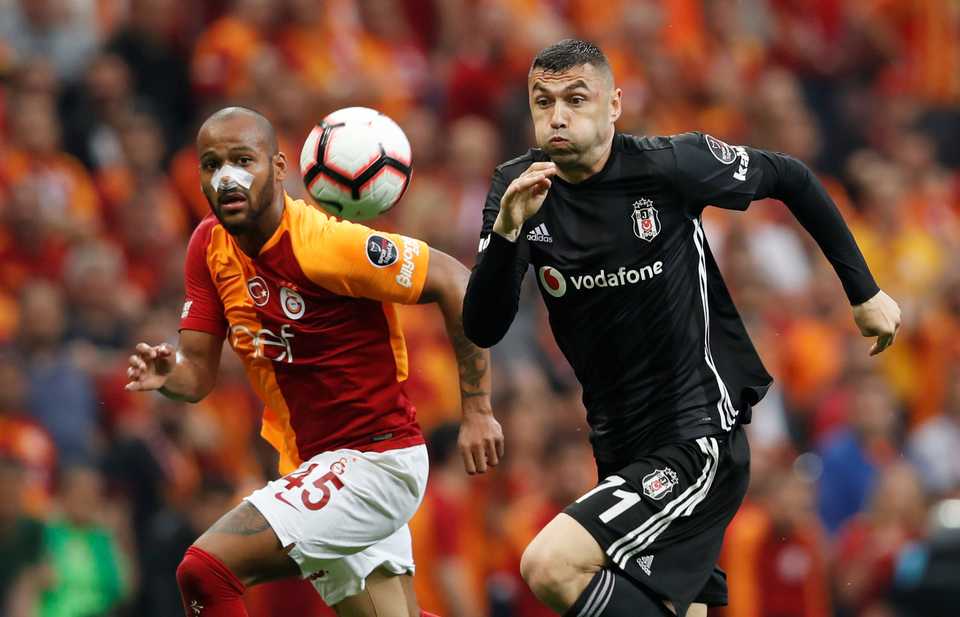 Soccer Football - Super Lig - Galatasaray v Besiktas - Turk Telekom Arena, Istanbul, Britain - May 5, 2019 Galatasaray's Marcao in action with Besiktas' Burak Yilmaz.